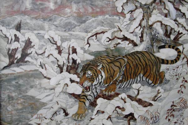 Landscape with a tiger in the winter woods